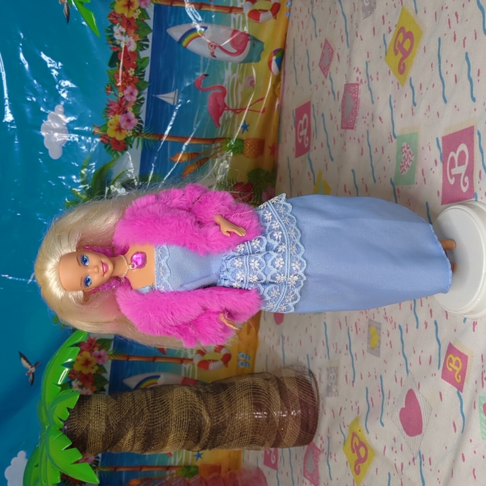 Barbie Doll in Vibrant Pink and Soft Blue Ensemble